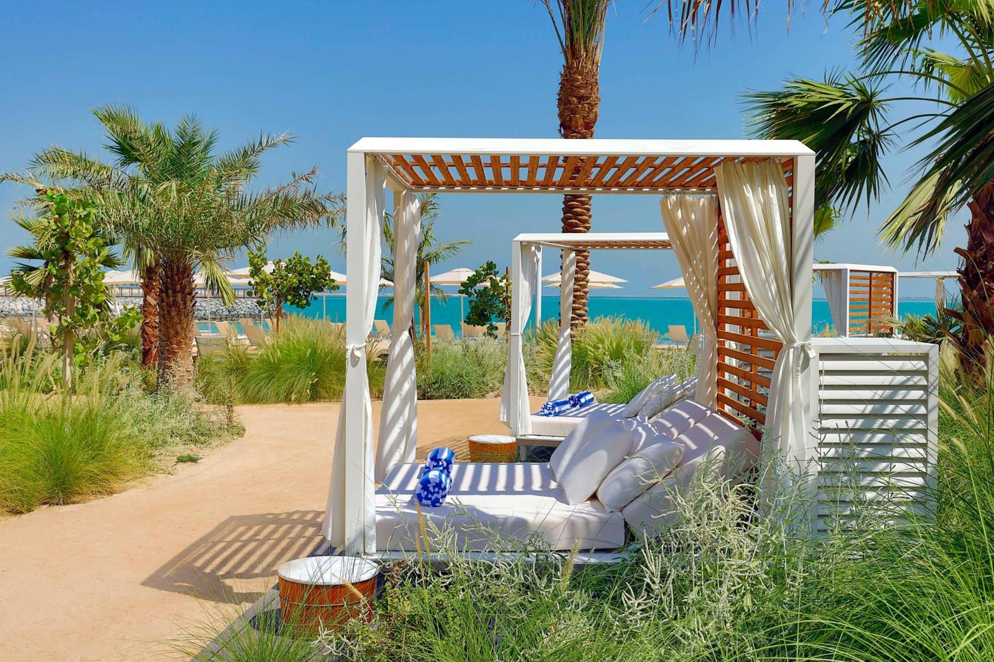 Waldorf Astoria Doha Lusail Экстерьер фото Cabana at Jumeirah Beach Hotel